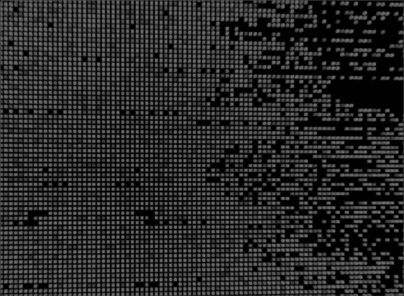 Pixel grid dissolving into scattered dots